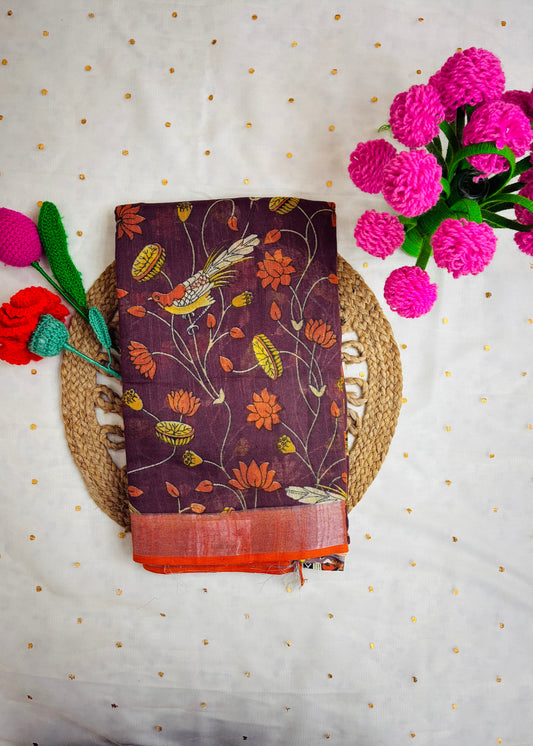 Decorative fabric with floral and bird pattern on a textured surface with flowers.