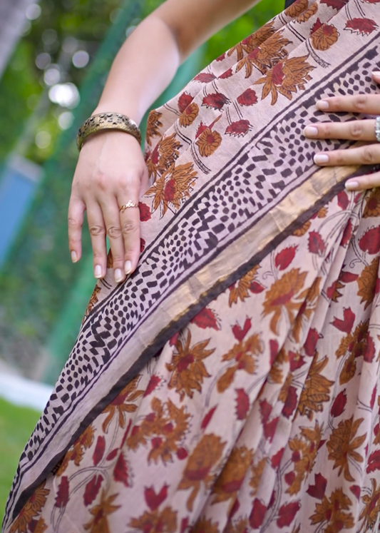 Close-up of a patterned fabric with a blurred natural background