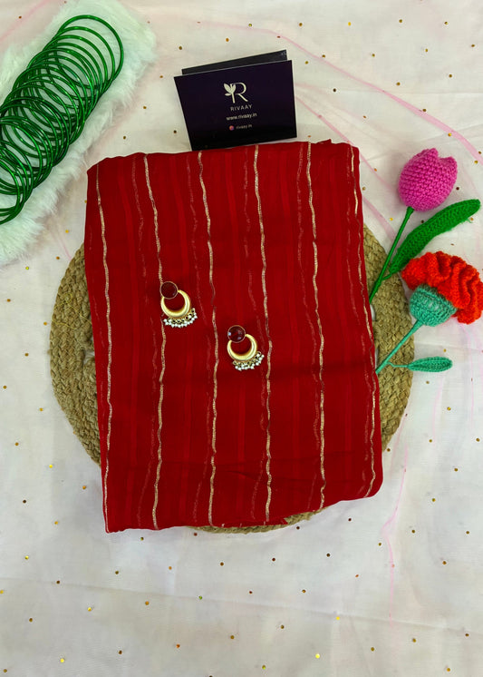Red striped pouch with decorative elements on a white background